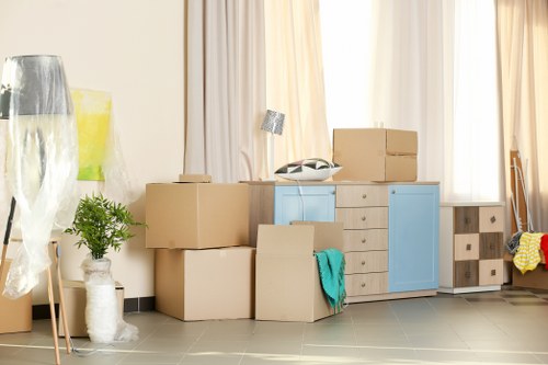 Man with van loading items for a local move in Uxbridge