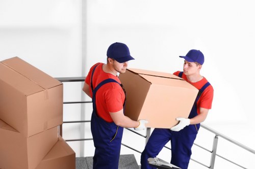 Removal staff assessing risks and preparing for a house move