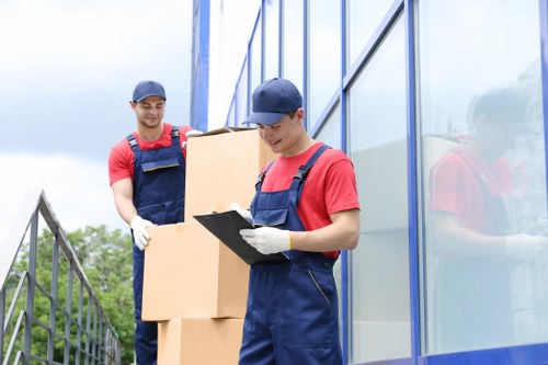 Office relocation planning in Uxbridge with packed boxes and office furniture