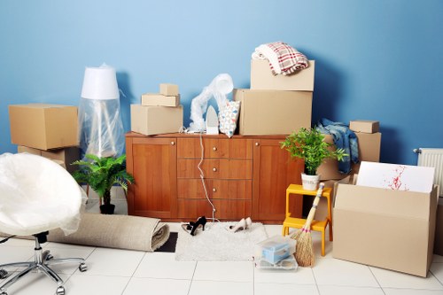 Local removals team handling furniture in Uxbridge