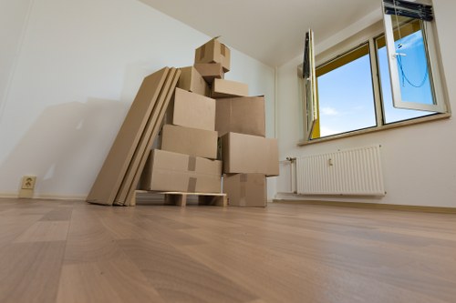 Careful unloading at a Uxbridge home with local movers