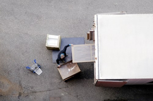 Removal team planning a house move in Uxbridge with boxes and furniture
