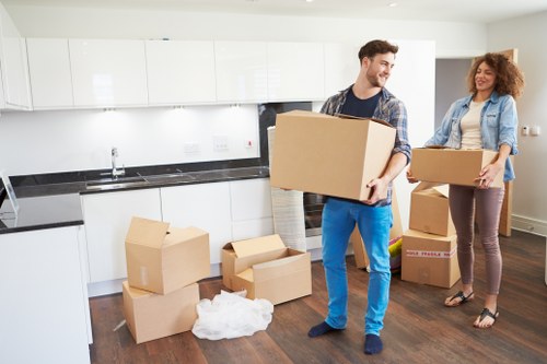 Carefully loaded moving van with furniture and packed household items