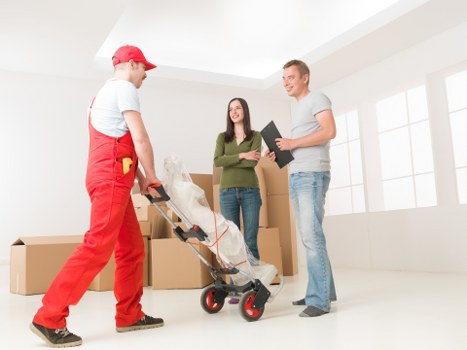 Packed furniture and household items secured inside a removal van