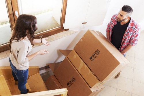 Preparing boxes and furniture for a moving truck booking in Uxbridge
