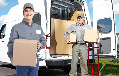 Loading furniture into a van for a Uxbridge collection