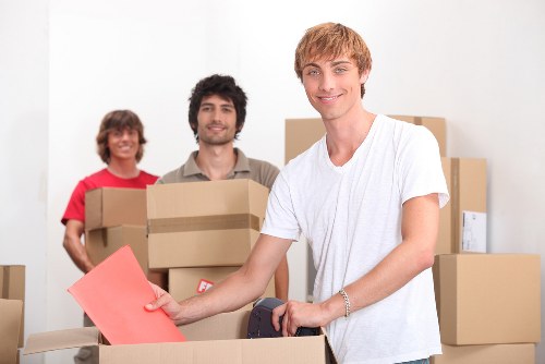 Unpacking boxes in a local Uxbridge property after moving day